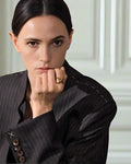Elegant, young woman models Geometric Crossover Statement Ring, angle 1