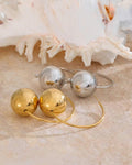 Gold and Silver Statement Orb Hoop Earrings, on on display 3