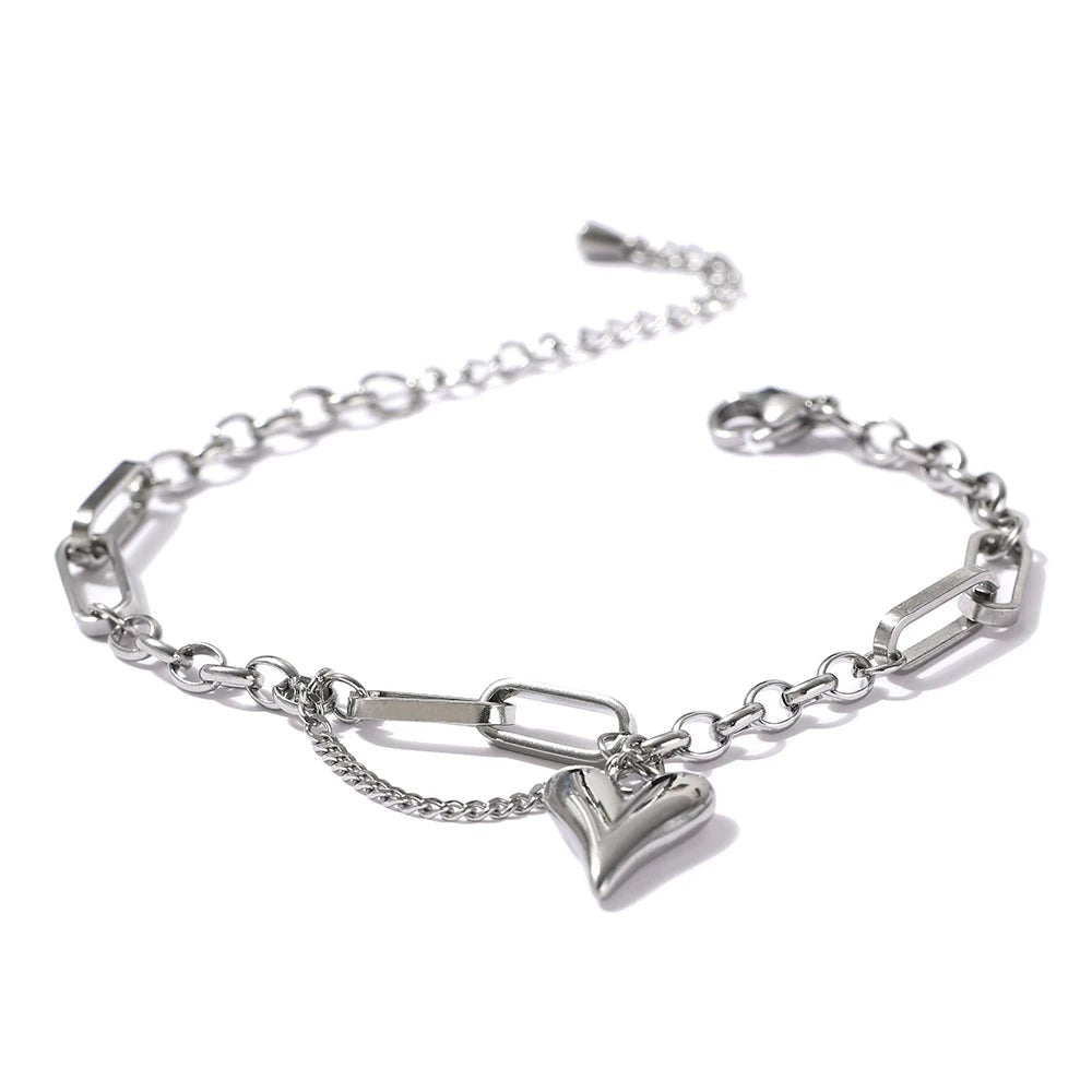 Silver Asymmetrical Heart Charm Bracelet on white background