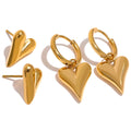 Gold Asymmetrical Heart Charm Earrings, on white background