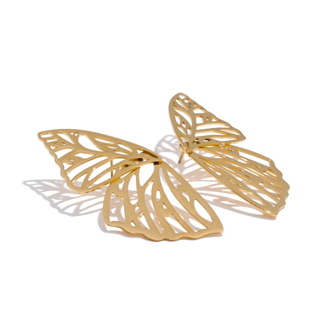 Gold Butterfly Wing Statement Earrings, on white background