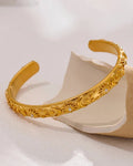 Gold Celestial Open Bangle - bracelet, on display