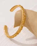 Gold Celestial Open Bangle - bracelet, on display 4