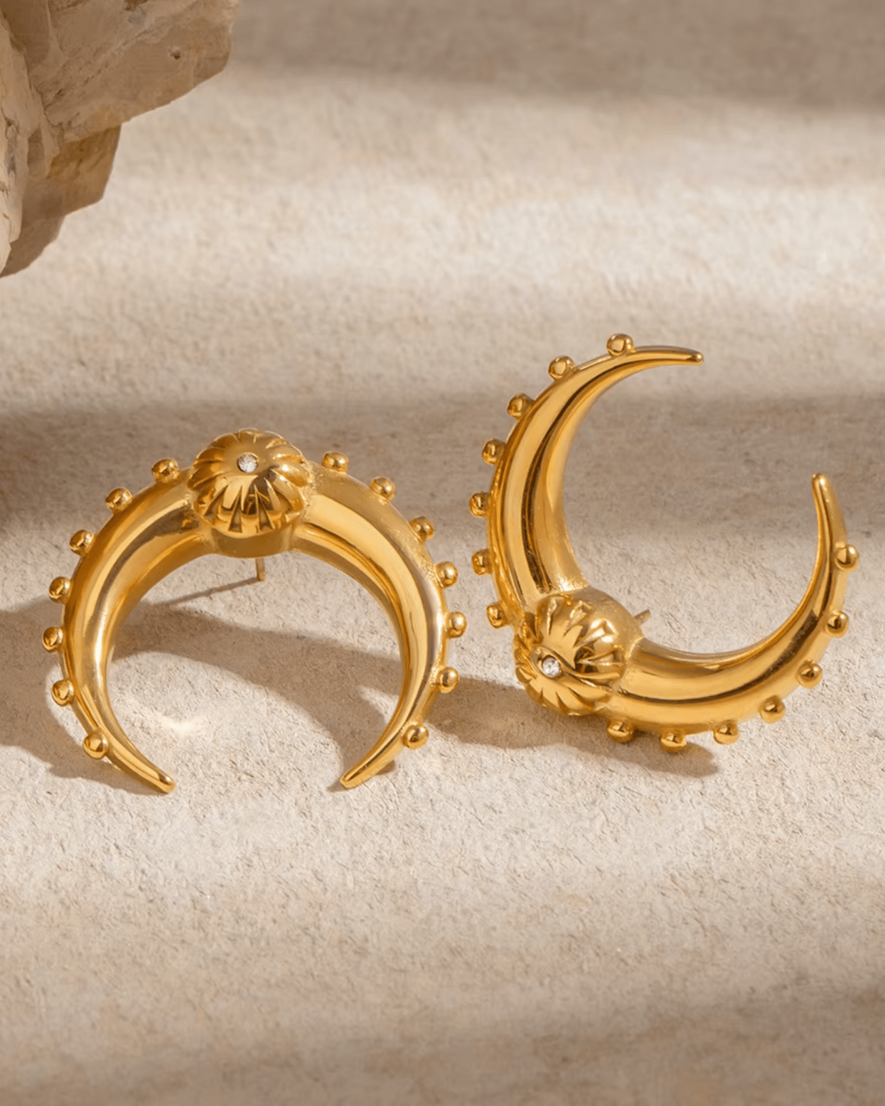 Gold Crescent Moon Earrings on display 2