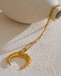 Gold Crescent Moon Pendant Necklace, on display 3