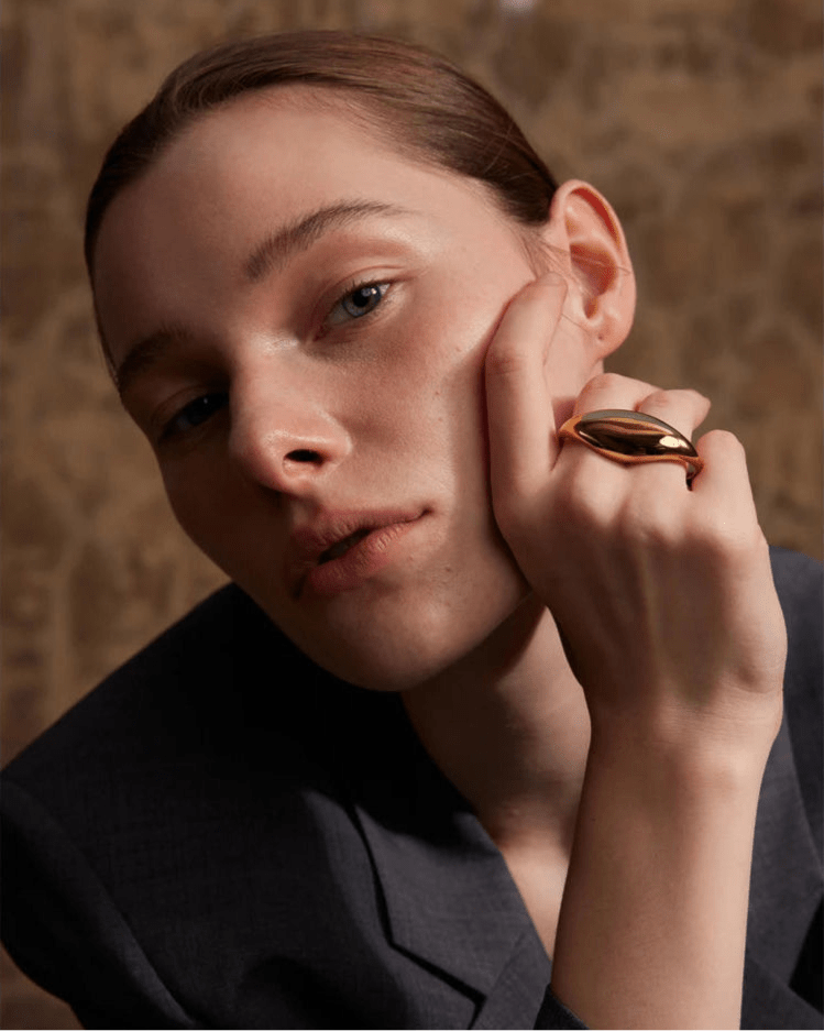 Elegant woman modeling Gold Dome Statement Double Ring, side