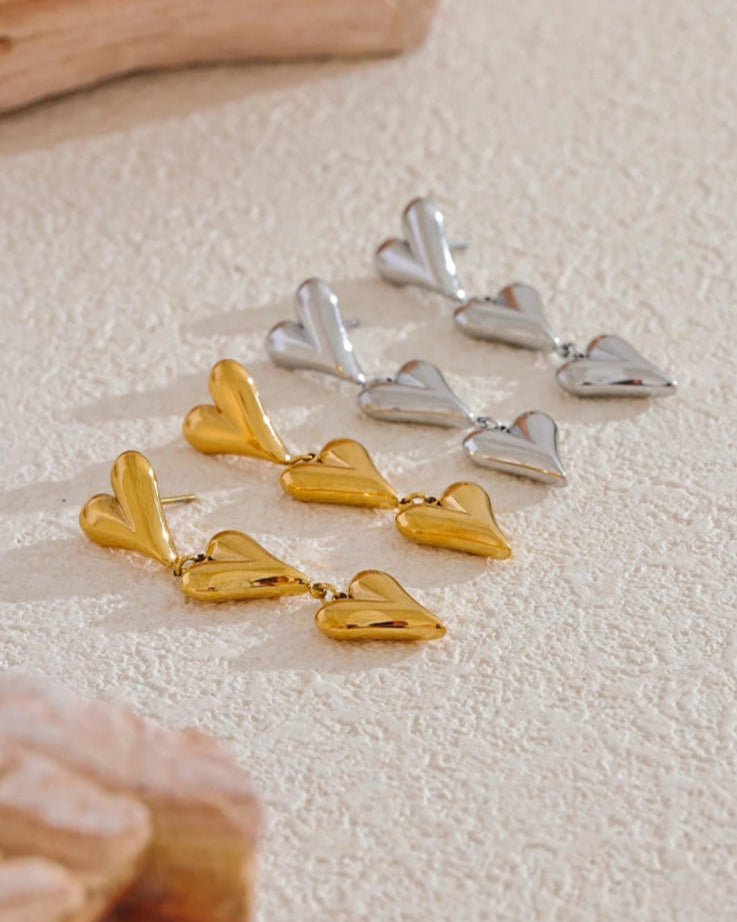 Silver and Gold Heart Charms Dangle Earrings, on display 2