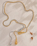 Gold and Silver Lariat Teardrop Rope Necklace, on display 1