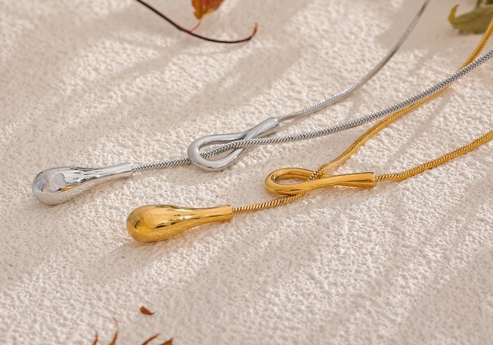 Gold and Silver Lariat Teardrop Rope Necklace, on display 5